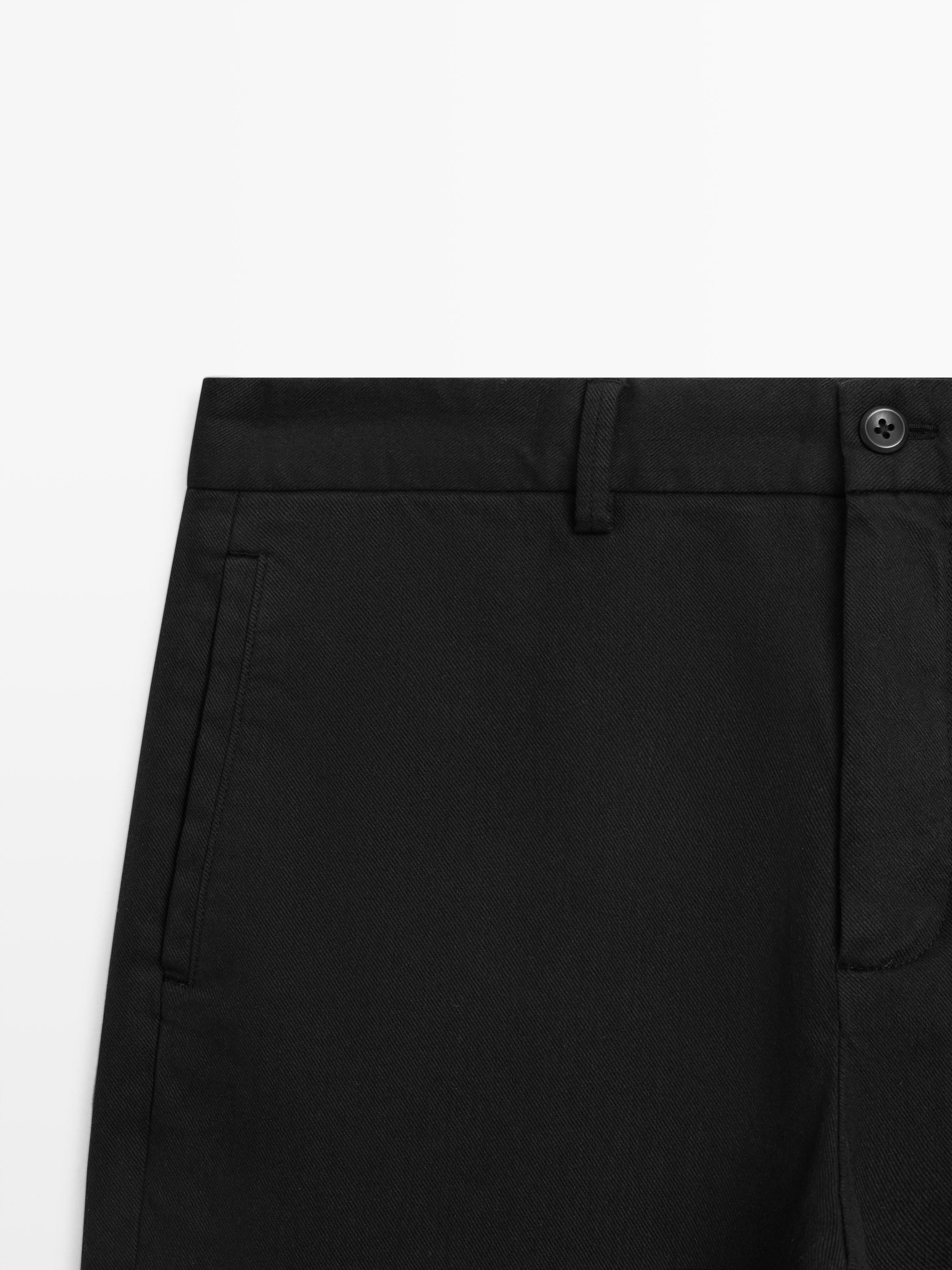 Tapered fit linen trousers
